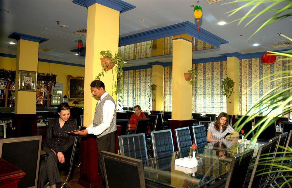 Concord International Hotel Manama Restaurant photo